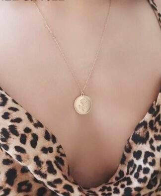 collier medaille fleur