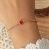 Bracelet chaine pierre facettee rouge