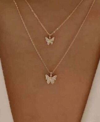 collier double rang papillon tendance 2024