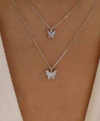 collier multi rang papillon tendance 2024