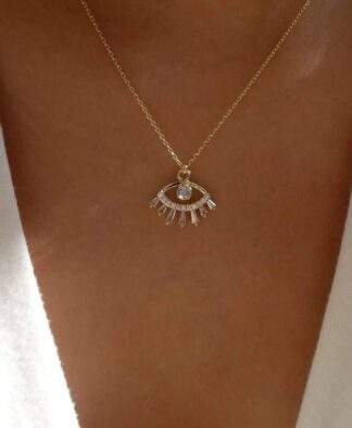 collier porte-bonheur dore tendance 2024